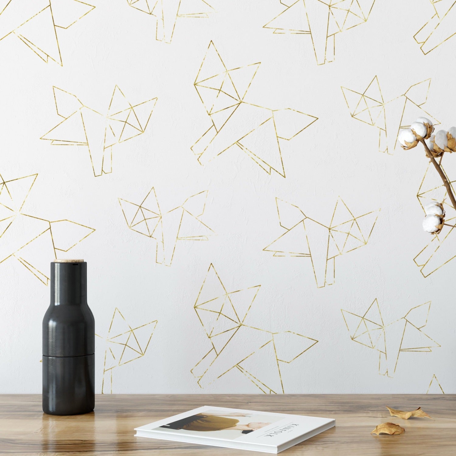 Stylish room with Gold Origami Wallpaper - Gold Fox pattern. The wallpaper showcases intricate gold foxes created from geometric lines, enhancing the room's contemporary aesthetic.