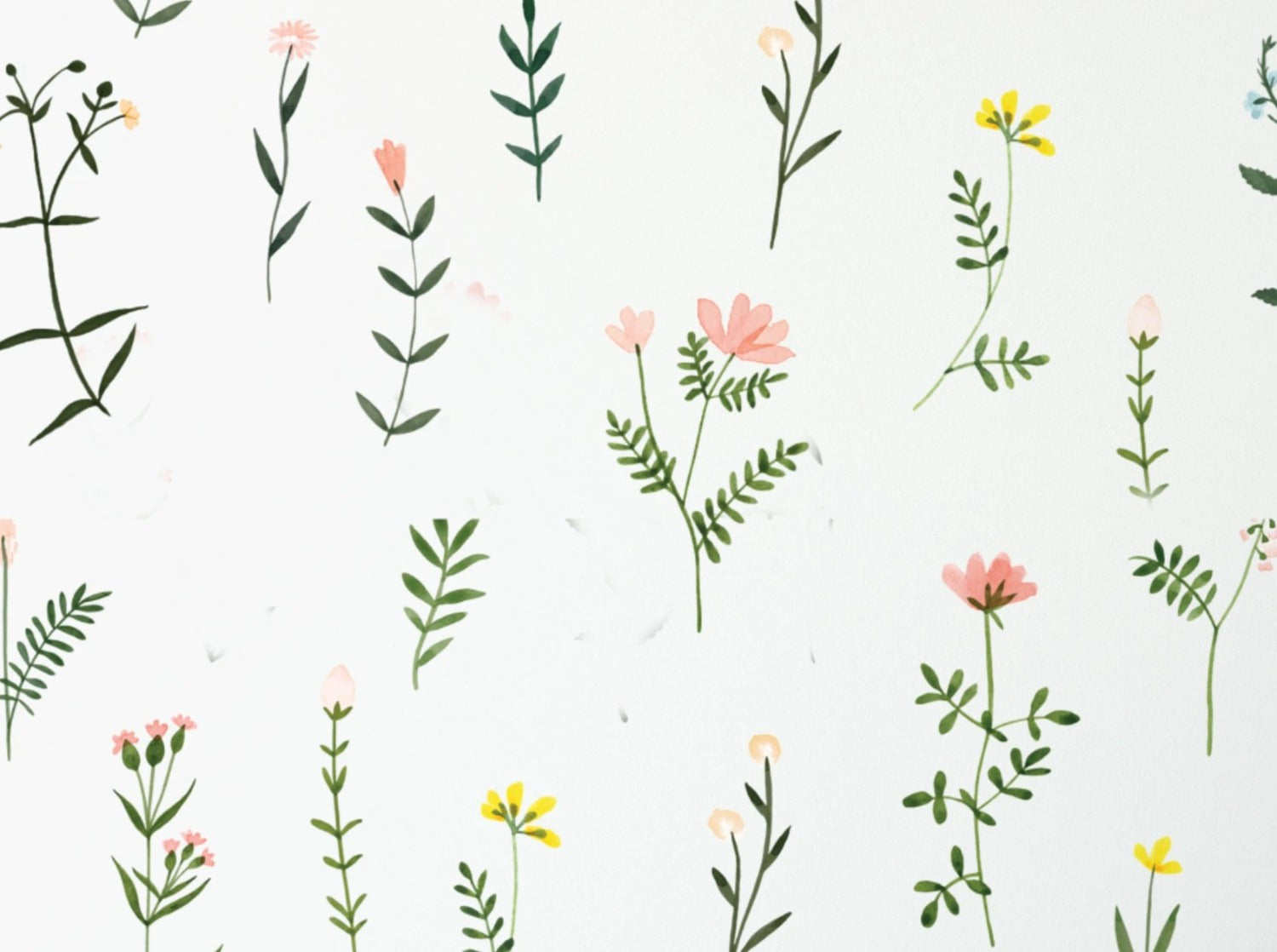 A detail shot of 'Floral Wallpaper - XII', displaying a whimsical pattern of hand-painted floral illustrations. The sprigs and flowers in soft pink, peach, yellow, and blue hues interspersed with green foliage are set against a crisp white background, giving a fresh and vibrant feel to the design