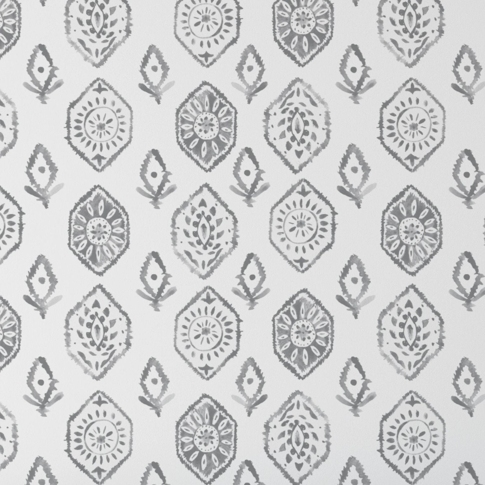 An up-close view of the Moroccan Tile Wallpaper IX, displaying a detailed pattern of gray Moroccan tile motifs on a white background, offering a modern take on traditional design