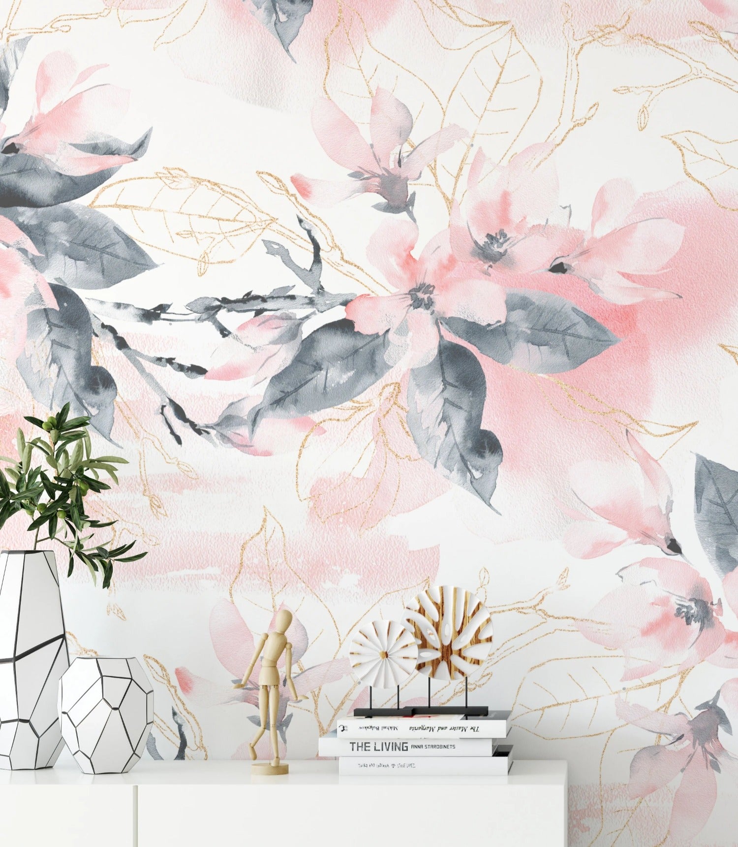 Interior design featuring the Elegant Wisdom Wallpaper VIII with light pink blossoms and golden branches over gray foliage, complementing a modern white and neutral toned room with stylish decor.