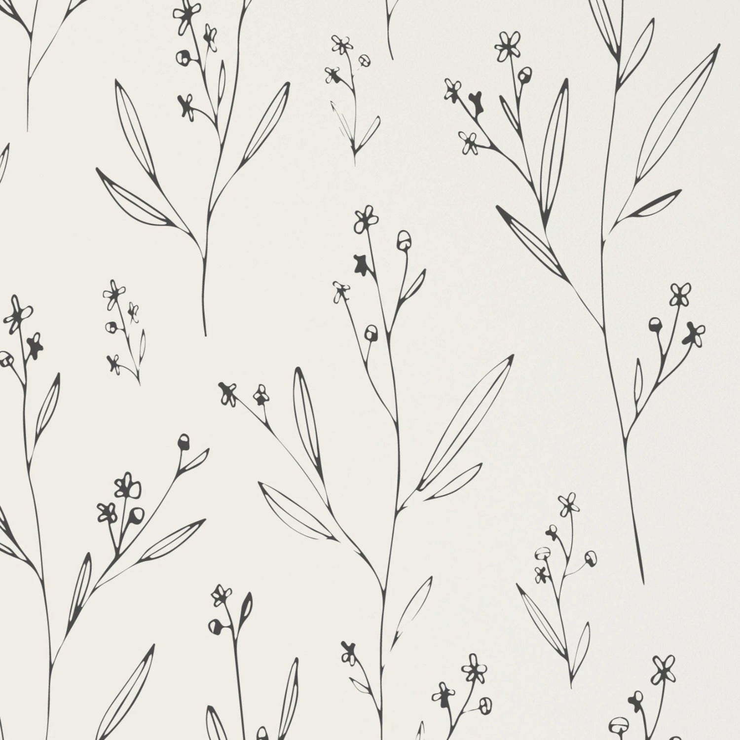 Close-up of the Dainty Minimal Floral Wallpaper featuring a black and white sketch-like design with slender branches and tiny flowers on a clean white background, offering a modern and simplistic aesthetic.