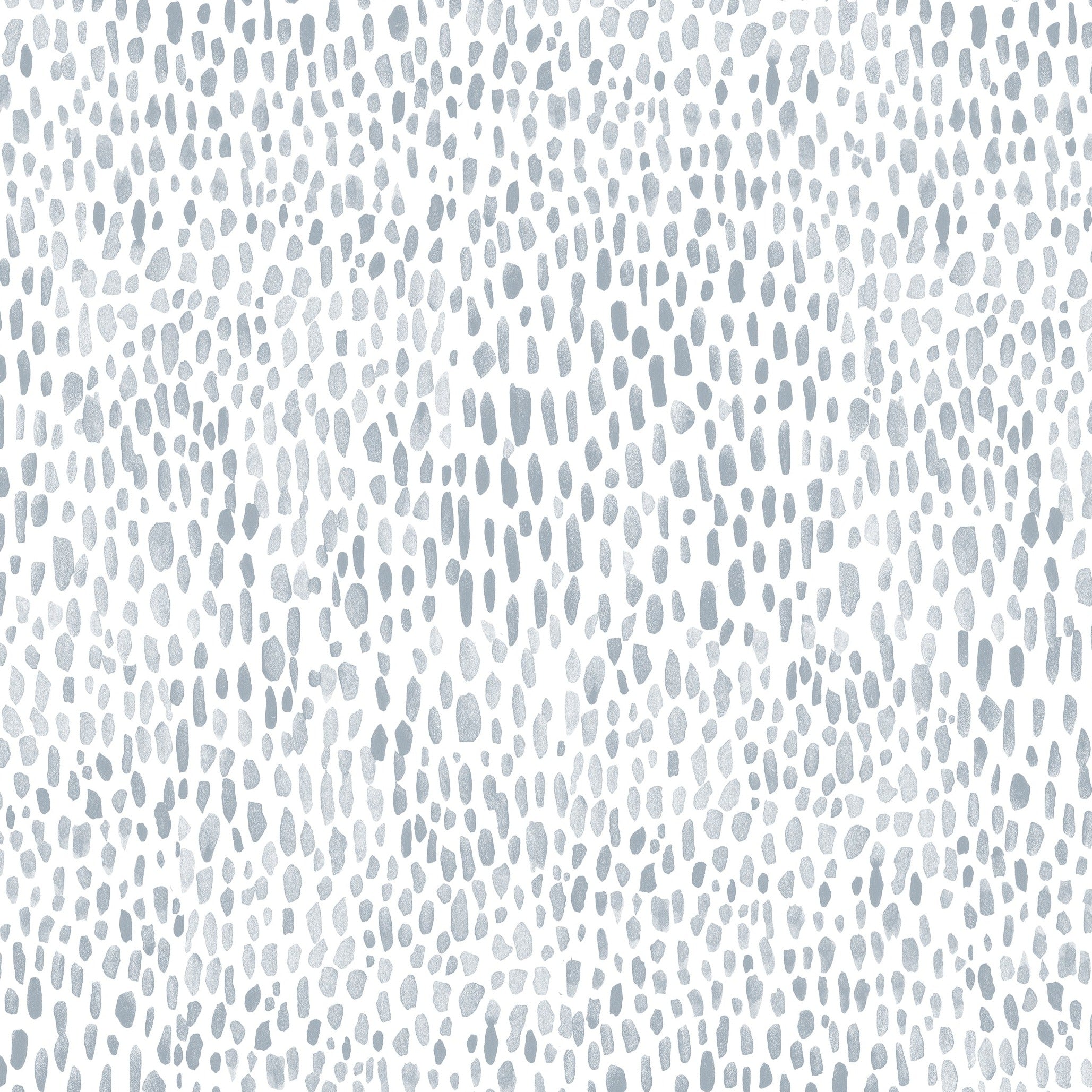 A detailed view of 'Big Boho Hand Painted Dots Wallpaper' showing a pattern of irregular hand-painted dots in shades of pale blue on a white background, giving off a playful and artistic vibe.
