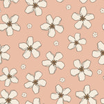 A close-up view of the Retro Pink Flowers Wallpaper, featuring large white flowers with golden centers spread across a soft pink background, creating a fresh and charming appearance.