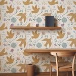 A home office space accented with Pastel Bird Wallpaper, where golden birds and pastel botanicals contribute to a soothing, nature-inspired work environment.
