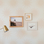Wall decorated with Sunshine Tropical Dreams Wallpaper featuring subtle sunburst designs.