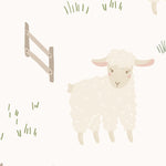 Playful children's room wallpaper featuring a pattern of fluffy white sheep and wooden fences scattered amongst patches of green grass on a soft cream background, creating a serene and charming farm scene.