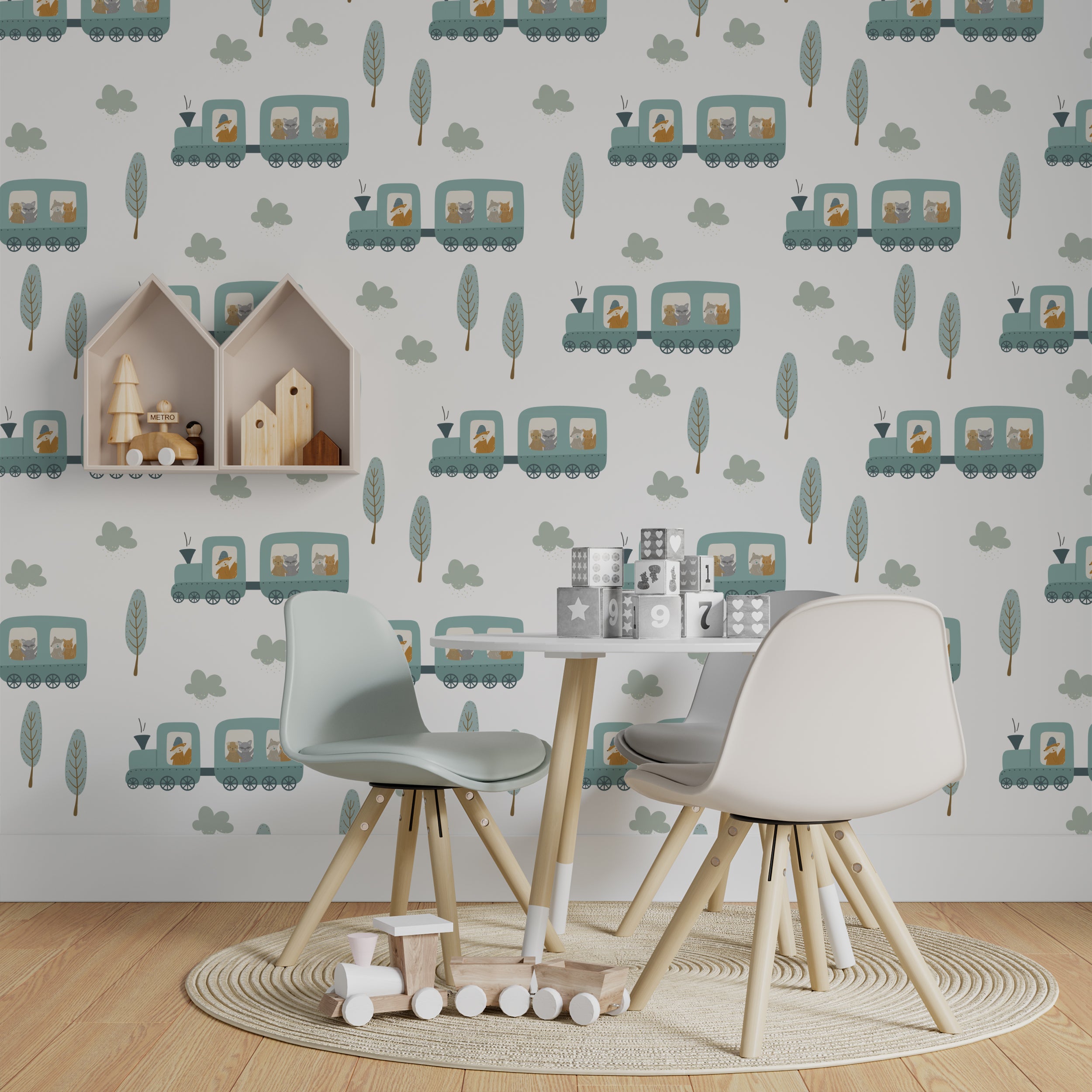 A playful children's room scene featuring the All Aboard Wallpaper, which is adorned with a charming pattern of trains carrying animals in various carts. The soft gray and blue tones create a gentle and fun backdrop, complemented by minimalist wooden furniture and playful toys, perfect for a child's play area.