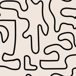 A close-up of a wallpaper with an abstract doodle design, featuring interconnected black lines forming irregular and flowing shapes on a beige background. The pattern is reminiscent of a spontaneous ink drawing, providing a modern and artistic feel.