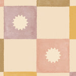 Close-up view of the Céline Wallpaper, showcasing a soft pastel checkered pattern with each square featuring a central sunburst motif in alternating shades of cream, pale pink, mustard, and taupe.