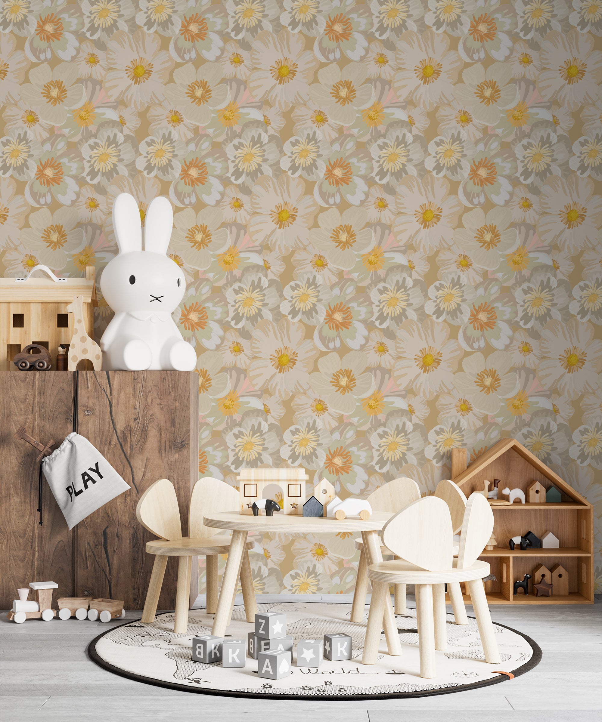 A children's playroom with furniture, including a small wooden table and chairs set, in front of a wall covered in 'Retro Flower Wallpaper' featuring a repeating pattern of large, stylized flowers in muted tones of cream, beige, yellow, and green