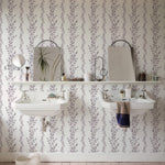 Classic Floral Wallpaper in a bathroom setup, providing a serene and graceful look with its vertical gray leaf designs on a pale background, complementing minimalist bathroom fixtures