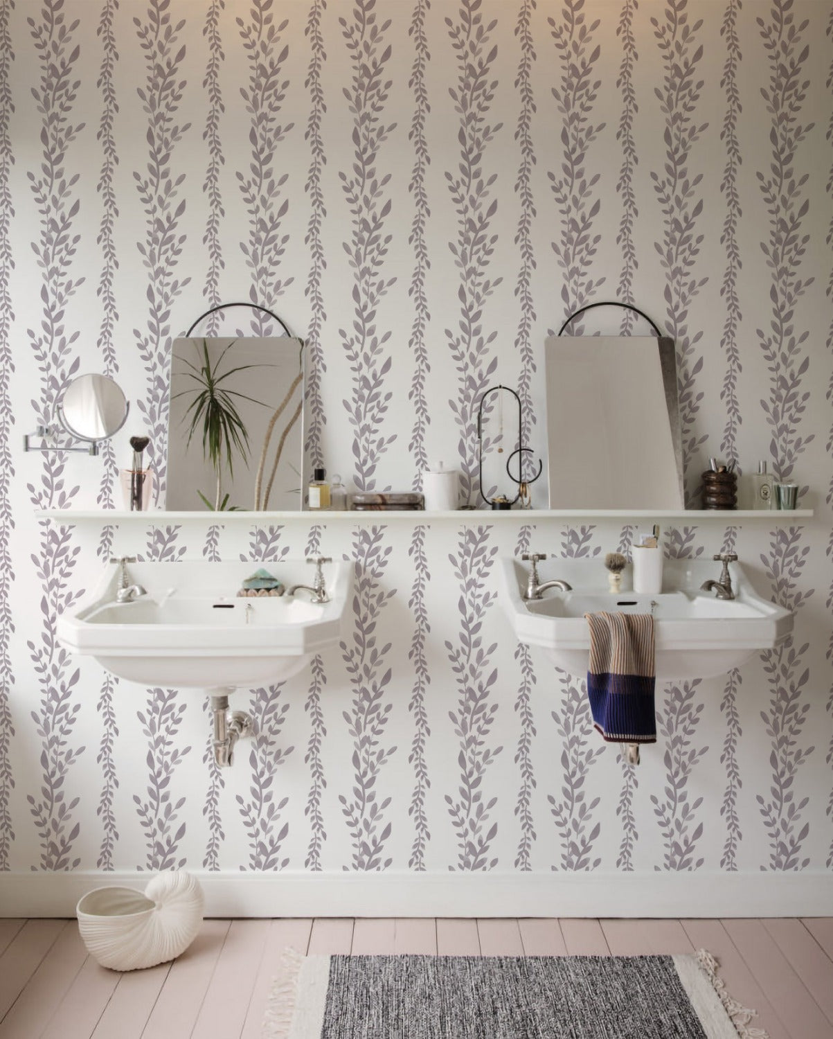 Classic Floral Wallpaper in a bathroom setup, providing a serene and graceful look with its vertical gray leaf designs on a pale background, complementing minimalist bathroom fixtures
