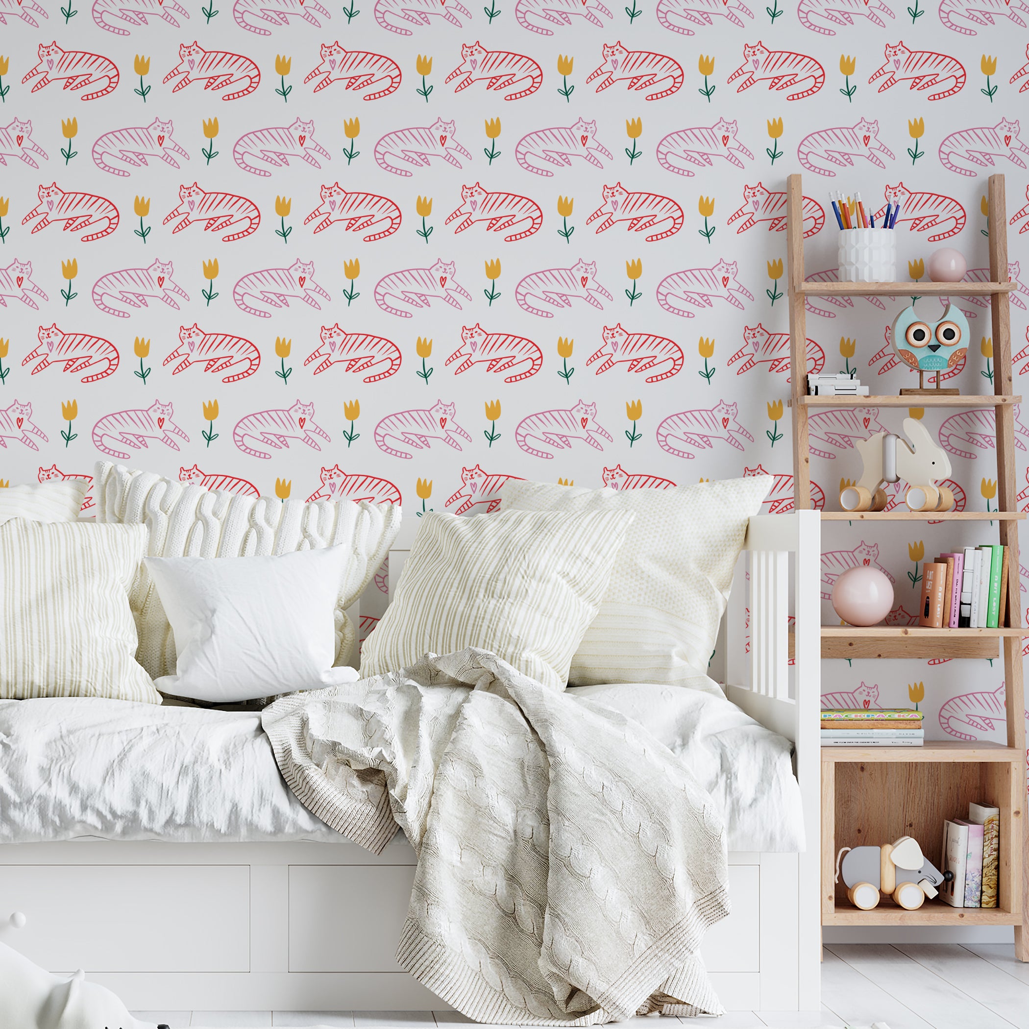 Children's bedroom decor utilizing 'Cat Wallpaper 1' with red striped cats and green tulips creating a playful and inviting atmosphere. The room is complemented by white and neutral bedding, enhancing the bright and cheerful wallpaper pattern