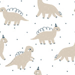 Detailed view of Dino Party Wallpaper showcasing playful beige dinosaurs with whimsical blue party hats and spiraled backs, set against a white background sprinkled with black dots.