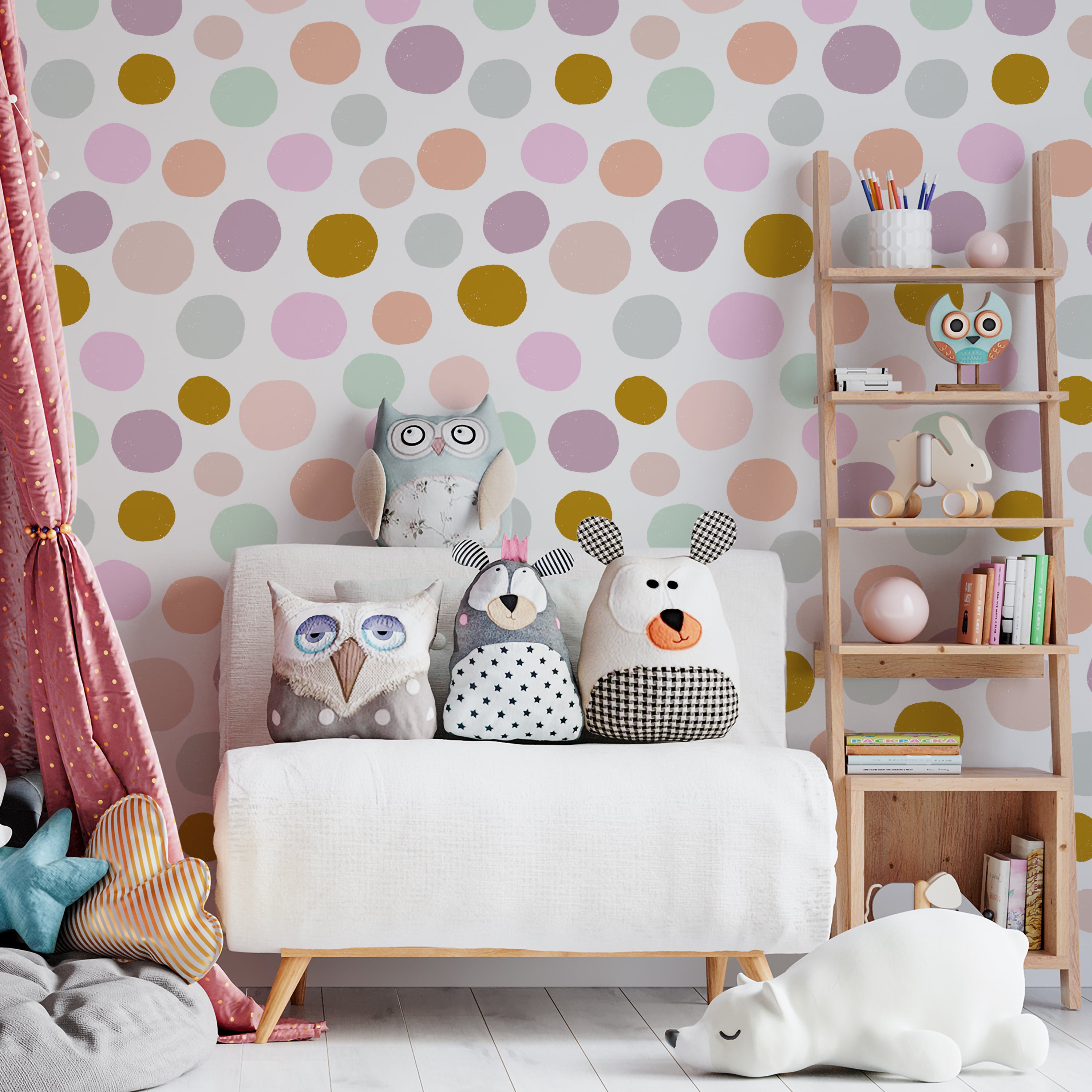 A children's room decorated with wallpaper that has a light, whimsical polka dot pattern in soft pastel colors, complementing a cozy reading nook with plush toys and a wooden shelf filled with books and play items.