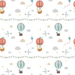 A close-up view of Balloon Adventure Wallpaper displaying a fun and vibrant pattern with hot air balloons, birds, and kites among clouds and rainbows, ideal for adding a touch of adventure and whimsy to any child's room.