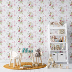 A playful and enchanting children's room adorned with 'Fairy and Flowers Wallpaper.' This magical wallpaper brings life to the room with its illustrations of fairies, butterflies, and tulips. The room is styled with a teepee playhouse and cozy wooden furniture, creating a dreamy and inviting space for children