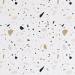 Detailed view of Stone Terrazzo Wallpaper featuring a diverse pattern of scattered geometric shapes in muted shades of black, gray, pink, and beige, reminiscent of traditional terrazzo flooring
