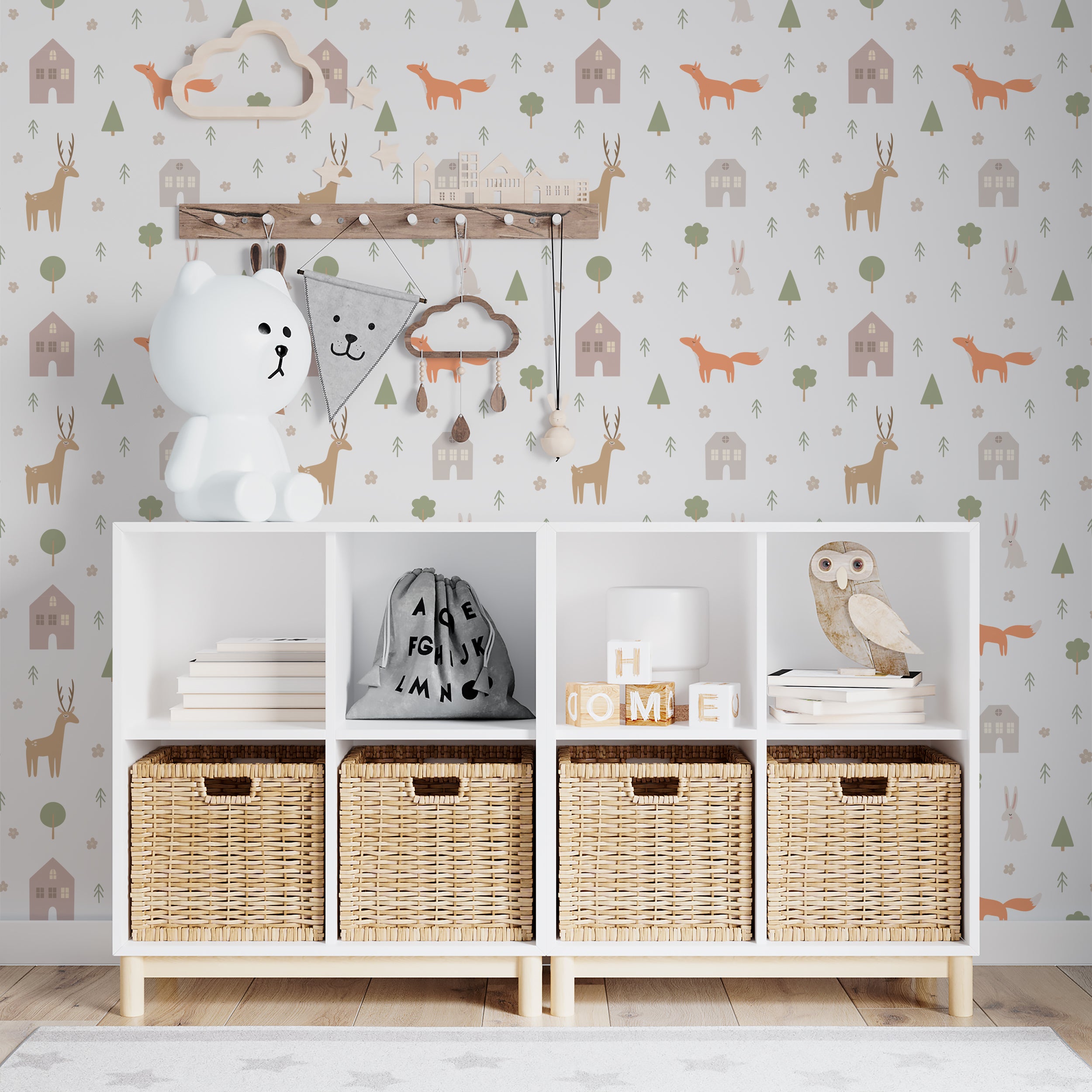 Children's room decorated with Stag and Fox Wallpaper enhancing the playful and whimsical atmosphere. The wallpaper includes motifs of stags, foxes, and forest elements, complementing the room's natural wood furniture and playful toys.