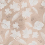 Close-up of the Shimmer and Floral Wallpaper displaying a delicate design of white flowers sprinkled with golden flecks on a soft beige backdrop, creating a sophisticated and inviting texture suitable for modern and classic decor styles