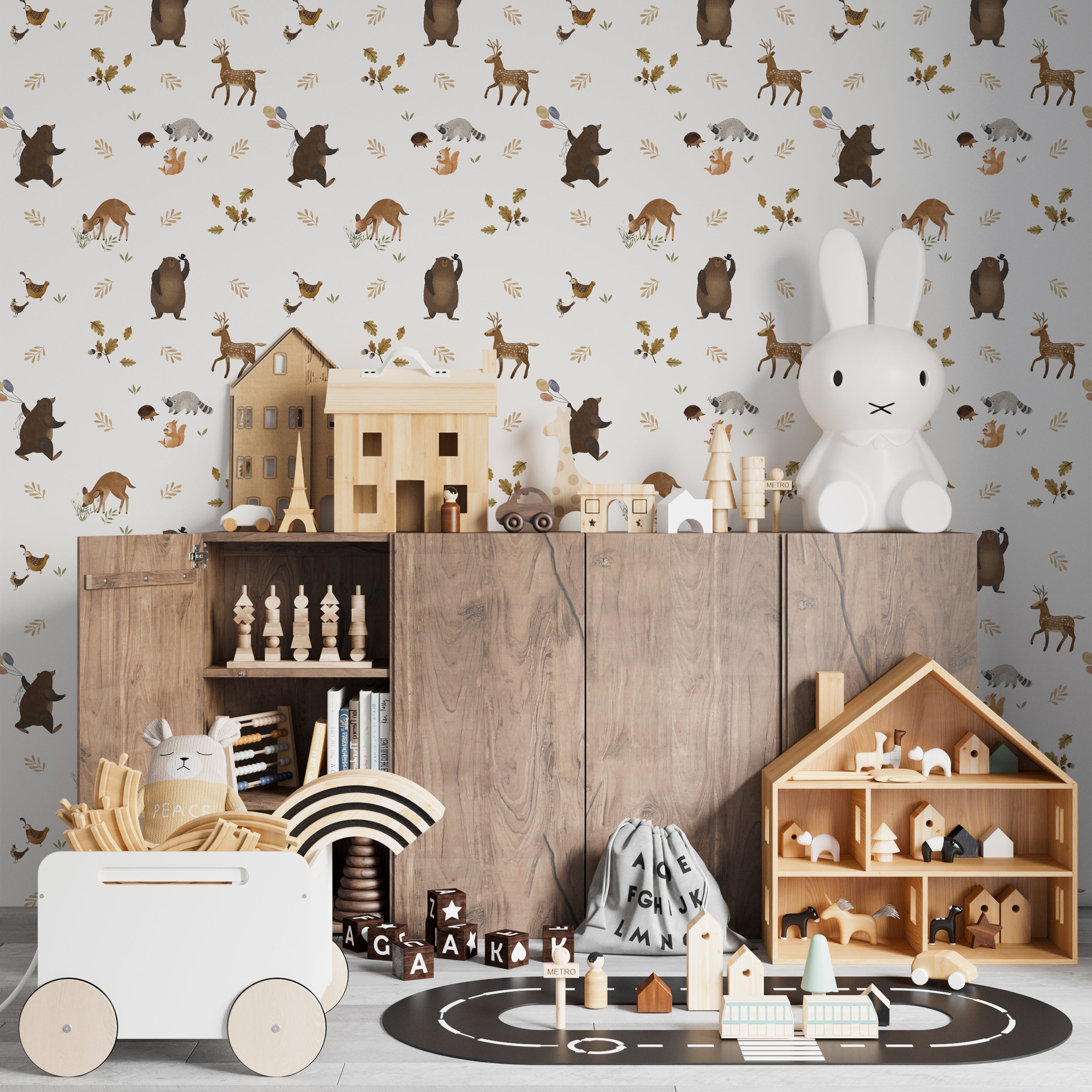 Decorative scene showing Forest Bear Wallpaper in a children's room setting. The wallpaper, filled with charming forest creatures such as bears, deer, and raccoons, complements a playfully arranged room with soft toys and children’s furniture, perfect for sparking imagination.