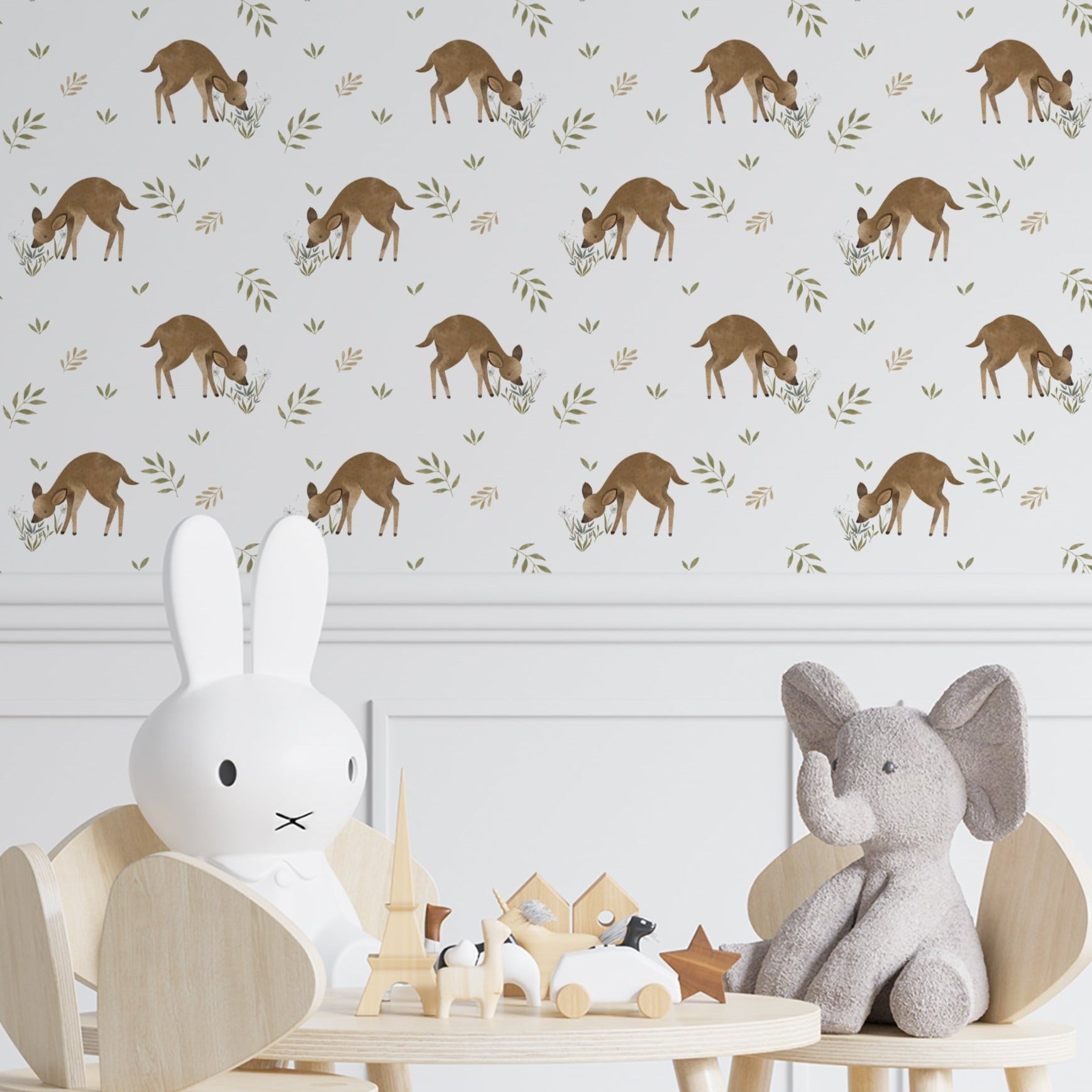 A cozy children's room decorated with Forest Fawn Wallpaper, enhancing the playful yet tranquil atmosphere. The gentle pattern of fawns, flowers, and leaves provides a naturalistic backdrop ideal for nurturing environments