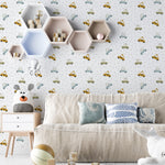 Interior decor featuring Cute Cars Wallpaper 01 on a wall behind a cozy living space with a beige couch, decorative pillows, and a child’s play area, demonstrating the wallpaper's appeal in a stylish, youthful setting