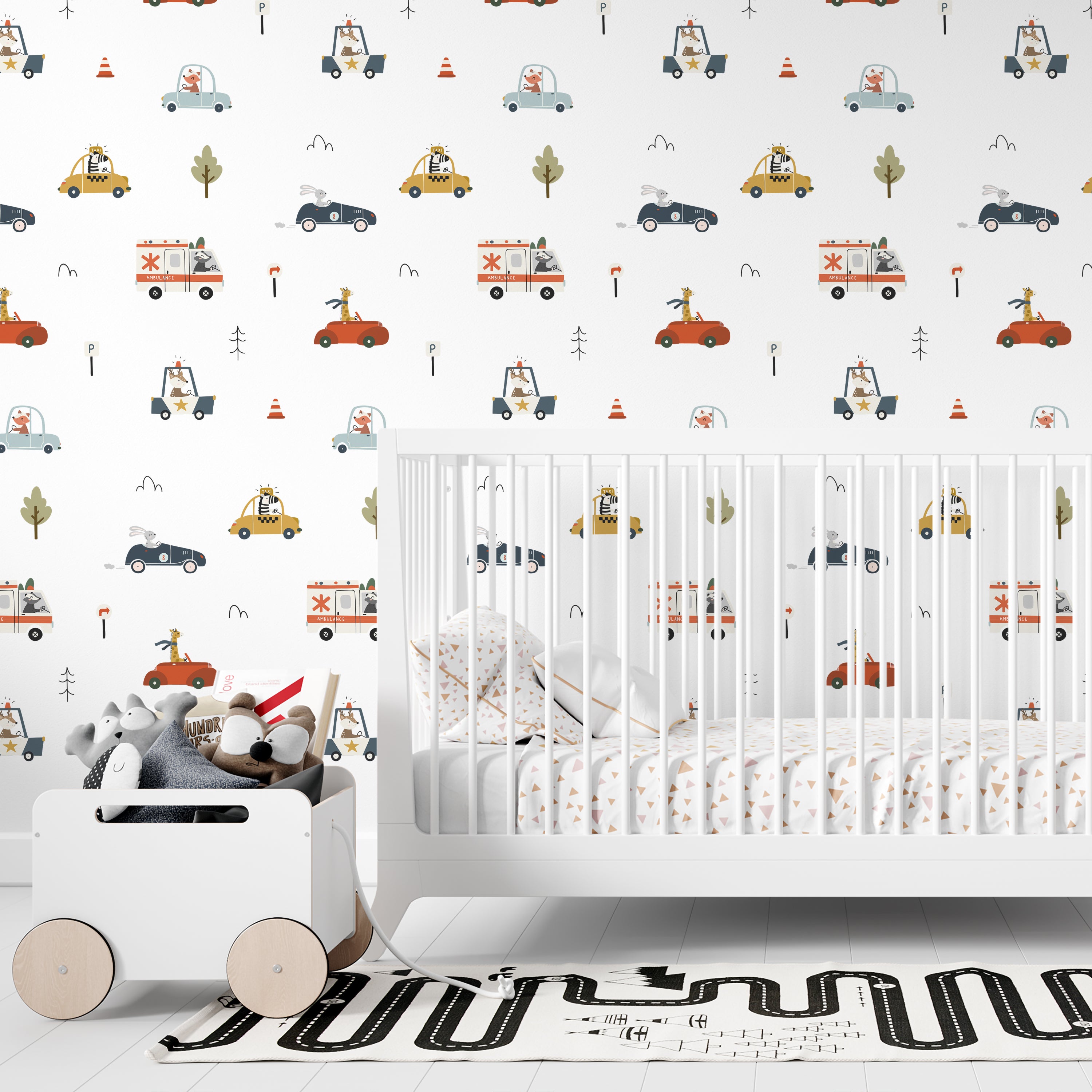 Nursery room decor highlighted by the Cute Cars Wallpaper 02 on the wall, showing playful scenes of cartoon cars driven by animals. The setting includes a white crib filled with plush toys, creating a cheerful and engaging atmosphere for children