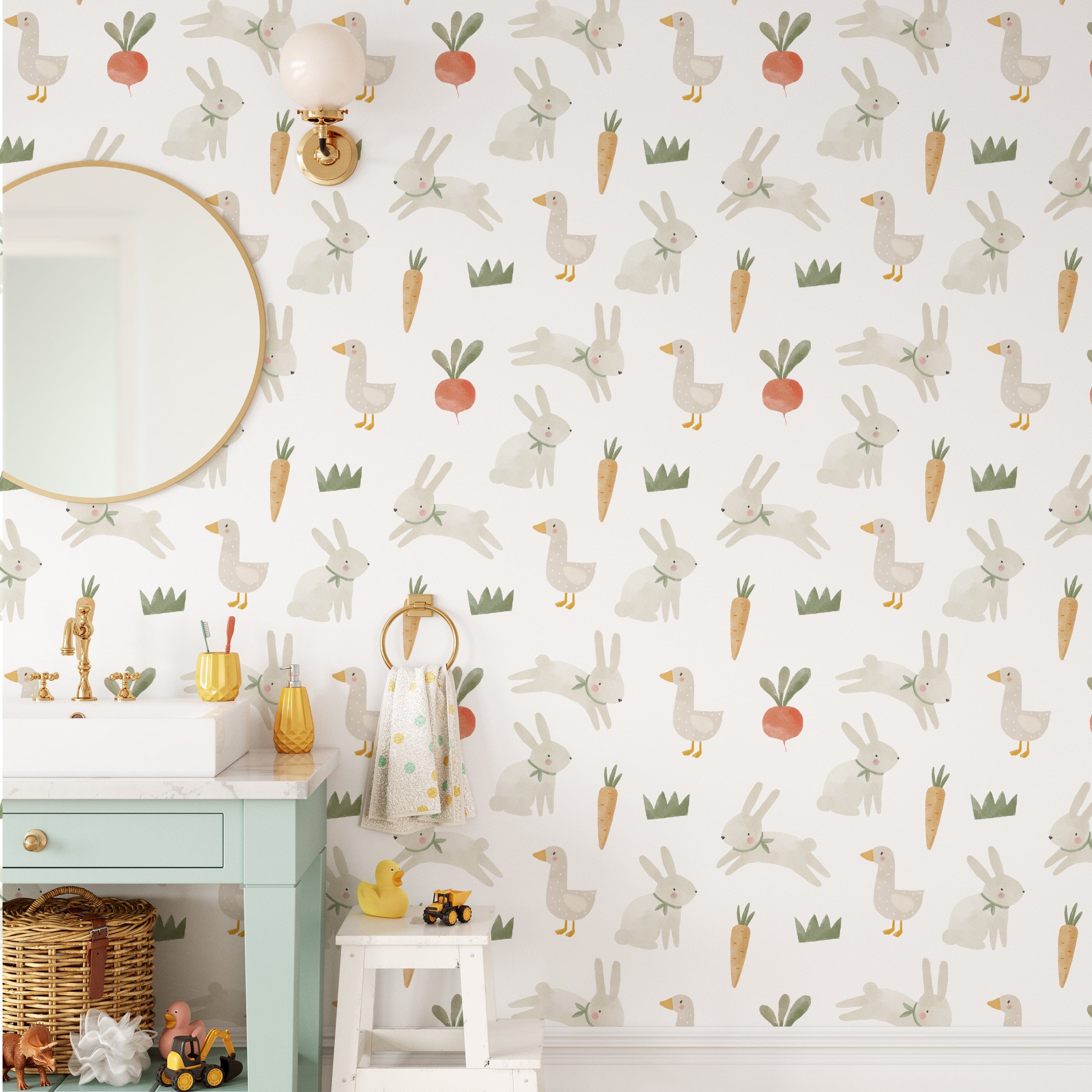 A children's bathroom decorated with Farm Friend Wallpaper - Happy Bunnies, featuring playful hand-drawn illustrations of bunnies, geese, carrots, radishes, and grass on a white background.