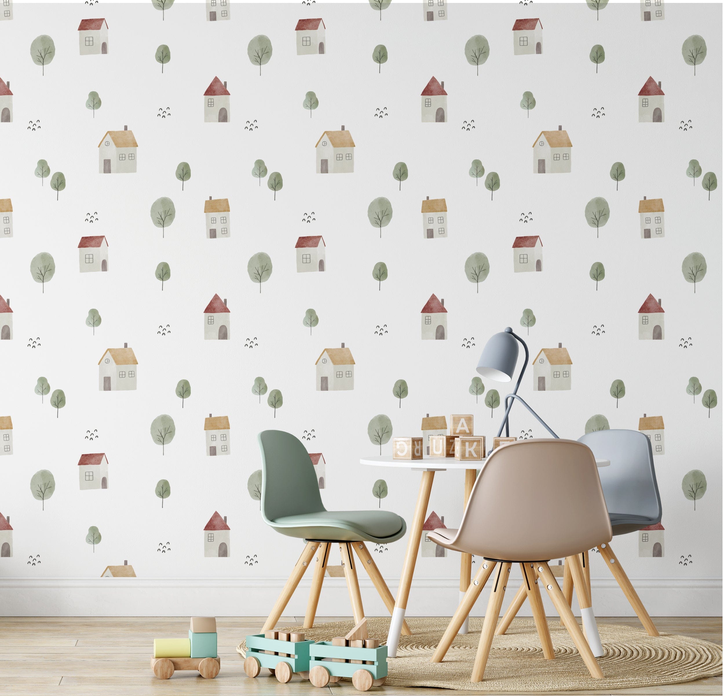 A cozy children's playroom featuring Farm Friend Wallpaper - Happy House, which displays a whimsical pattern of houses with red and yellow roofs, surrounded by green trees and tiny birds, creating a playful and inviting atmosphere.