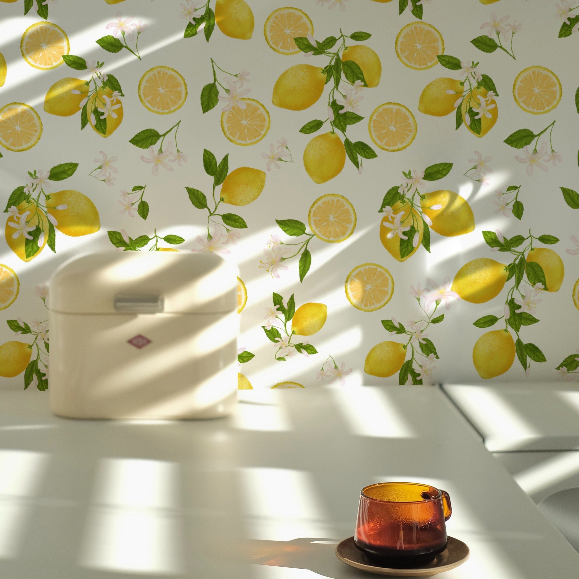 Lemon Floral Wallpaper with a bright and fresh pattern of yellow lemons, green leaves, and white flowers, creating a sunny and vibrant look in a kitchen setting