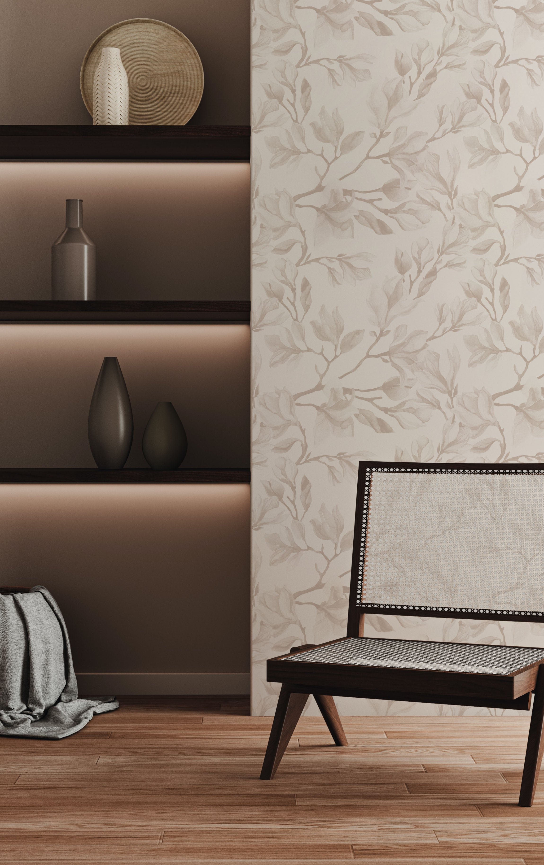 A warm and inviting corner illuminated by ambient lighting, with the 'Blooming Magnolia Wallpaper' adorning the wall and adding a botanical sophistication next to a dark wooden chair and minimalist shelf decor.