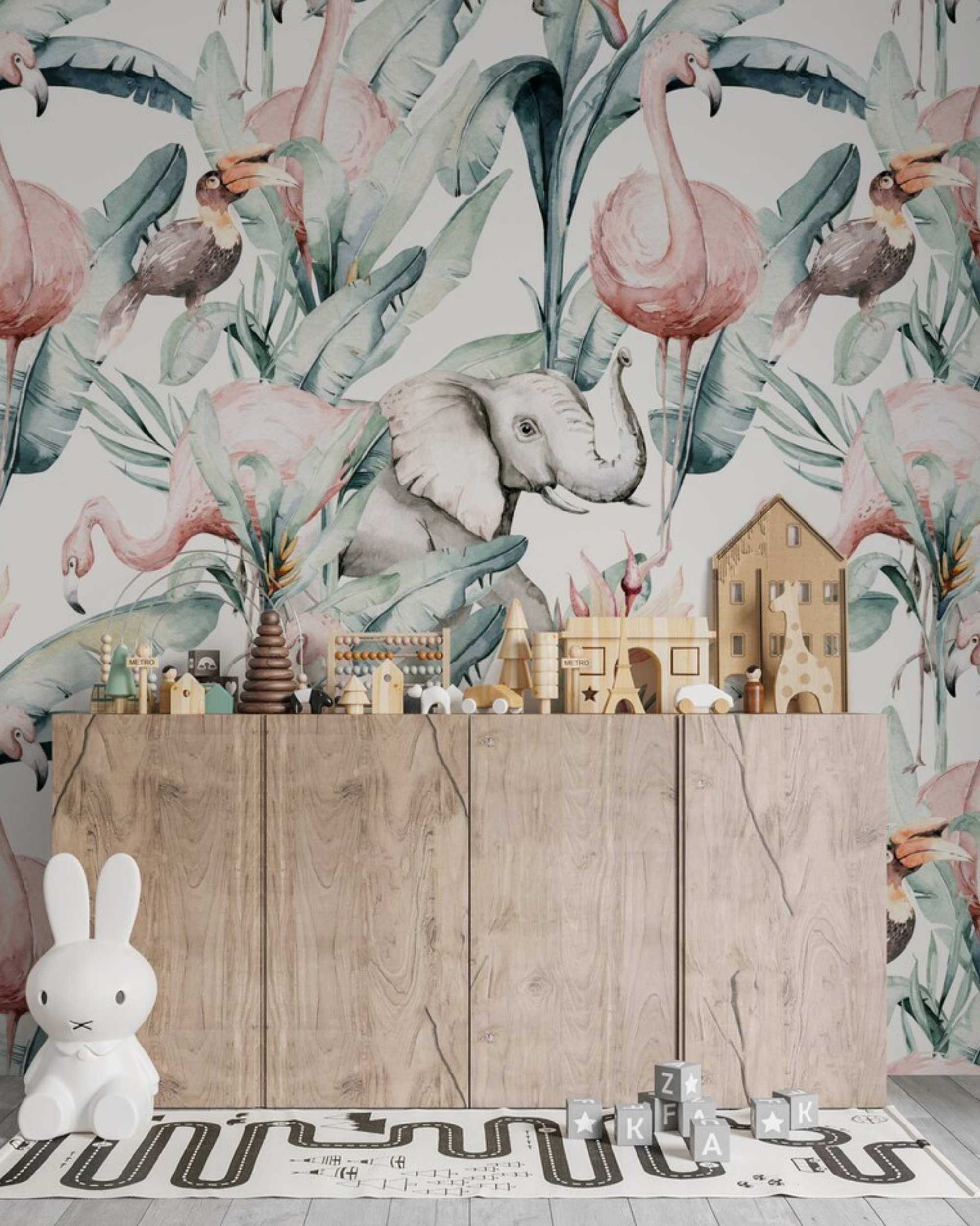 Children's playroom featuring 'Tropical Wallpaper - African Animals' with a vibrant scene of elephants, flamingos, and tropical foliage, complemented by a wooden toy storage unit filled with colorful toys.