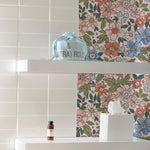 Watercolour Floral Wallpaper II in a stylish bathroom setting, showcasing vibrant floral patterns and modern decor