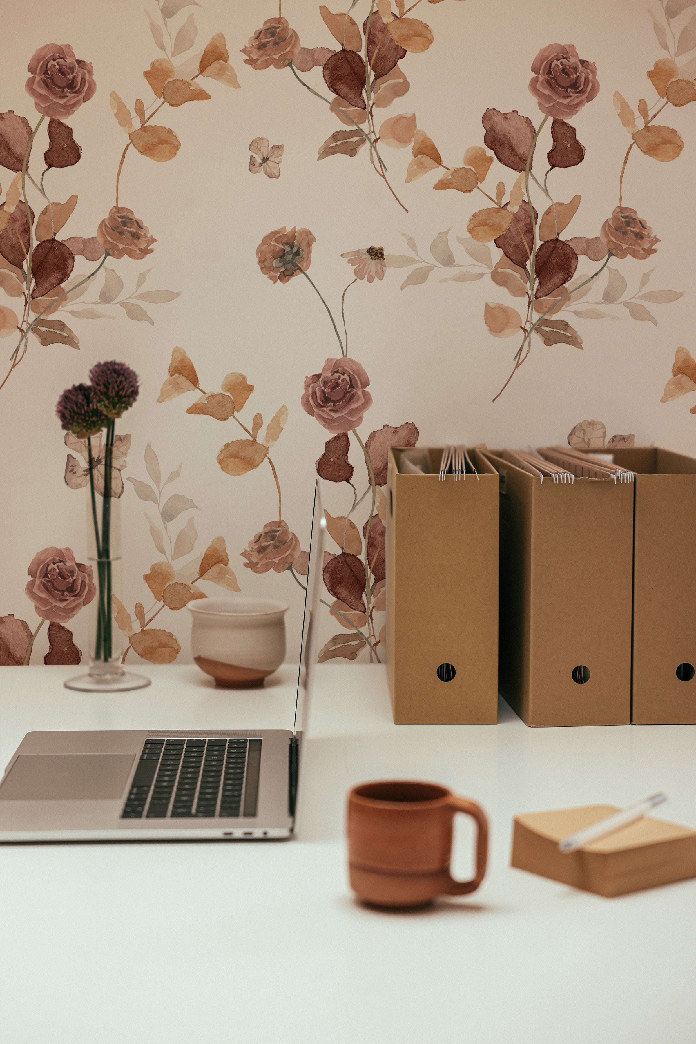 A workspace accented with Autumn Floral Wallpaper, enhancing the office with natural light and soft floral motifs in shades of rose, beige, and brown, providing a calming and beautiful environment for productivity.