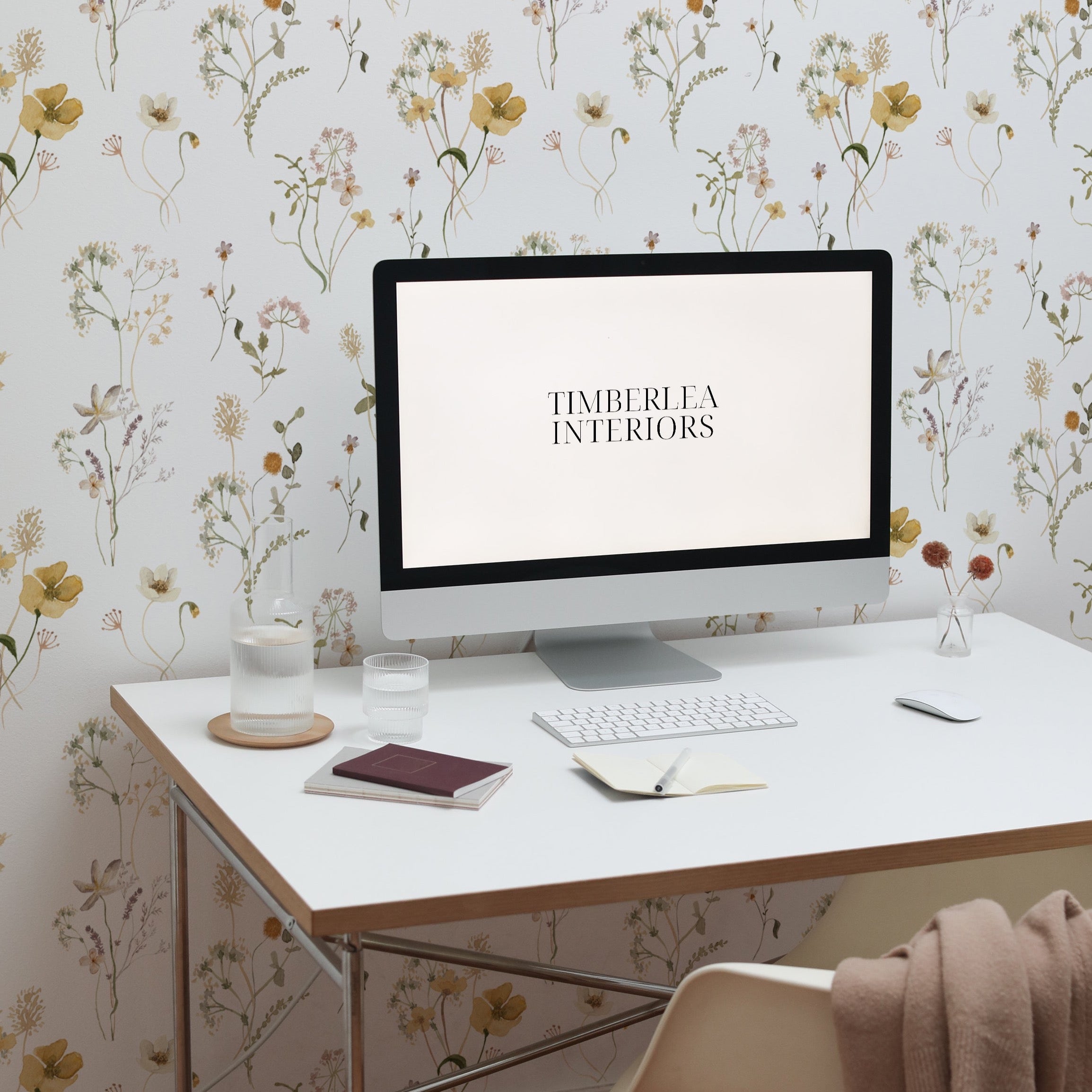 A modern home office brightened by the Delicate Floral Wallpaper, offering a calming floral pattern that creates a serene workspace.