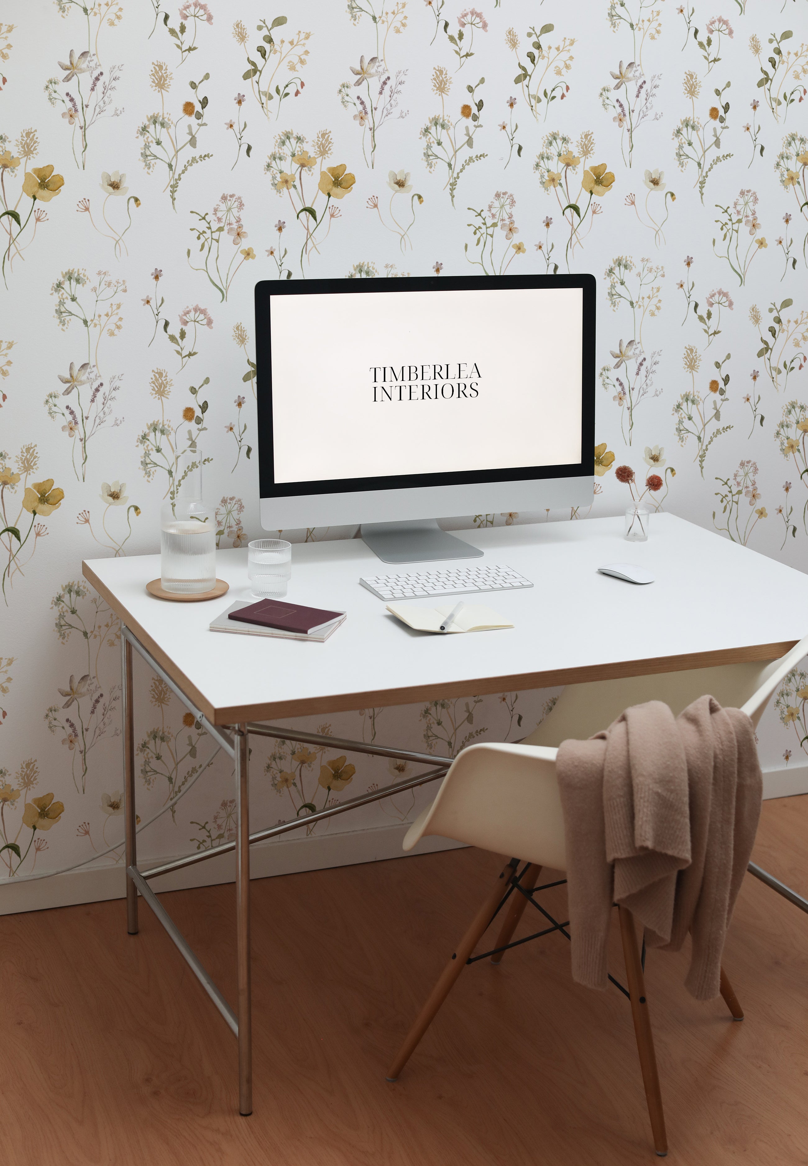A modern home office brightened by the Delicate Floral Wallpaper, offering a calming floral pattern that creates a serene workspace.