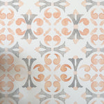 Close-up view of Moroccan Dream Tile Wallpaper II, featuring a geometric pattern in soft shades of orange and gray. The design mimics traditional Moroccan tiles, creating an elegant and subtle visual effect.