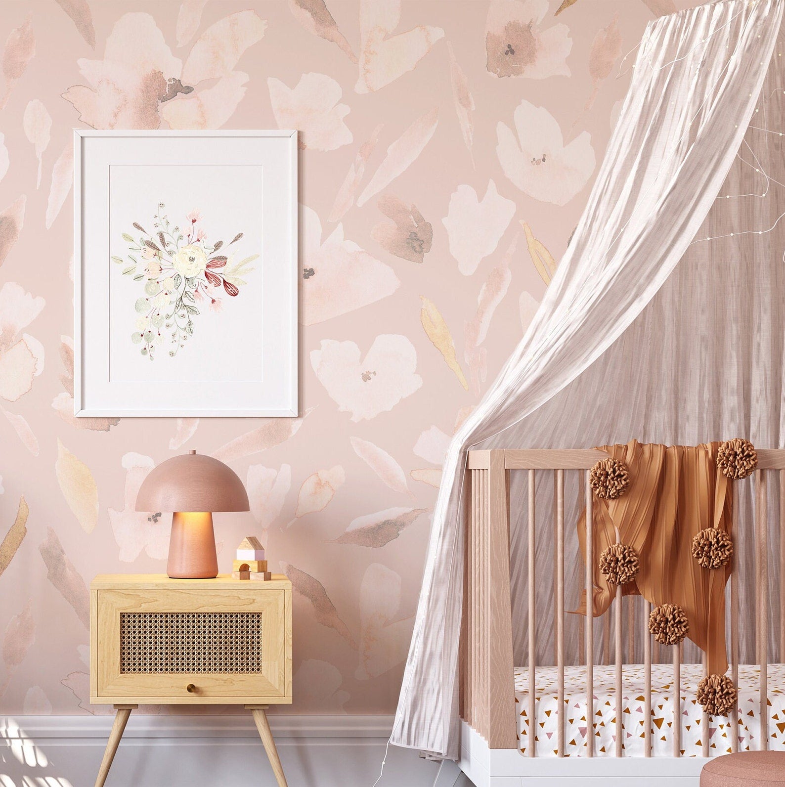 A nursery wall adorned with the Prettiest in Pink Floral Wallpaper, highlighting the gentle watercolor floral pattern, which provides a backdrop for a modern crib and a stylish wooden stool, together creating a tranquil and stylish baby's room