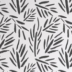 Close-up of the 'Black Floral Wallpaper - Modern Abstract' with a striking black brushstroke design on a white background. The pattern consists of abstract leaf-like shapes, giving the wallpaper a dynamic and modern artistic flair.