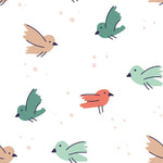 Close-up of nursery wallpaper with pastel bird patterns on a speckled background.