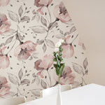 Two rolls of Pink Watercolour Floral Wallpaper displayed side by side, highlighting the repeating pattern of pink watercolor flowers and grey leaves